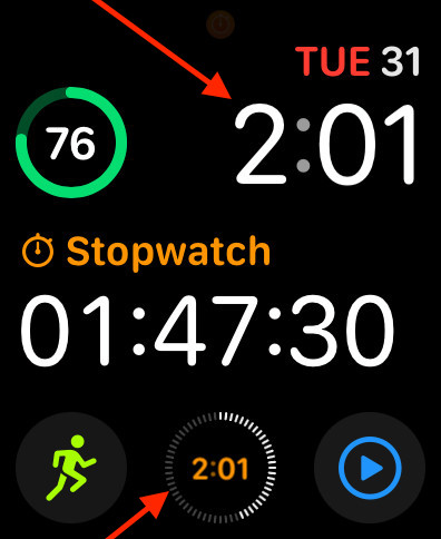 The Modular watch face for Apple Watch. Red arrows point to the time and a small complication showing the time.