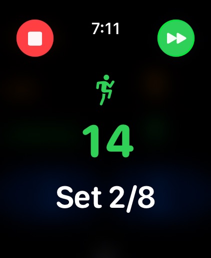 A Tabata timer showing 14 seconds left in a work phase of set 2 of 8. There is a symbol of a running figure showing we are working.